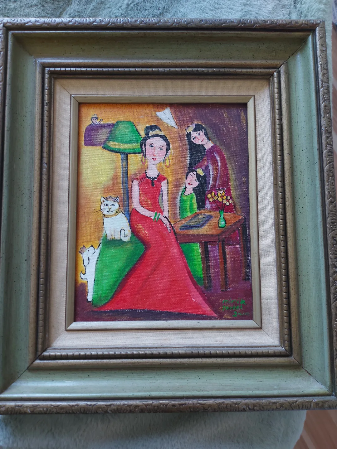 Framed Painting of a Woman in Red Dress