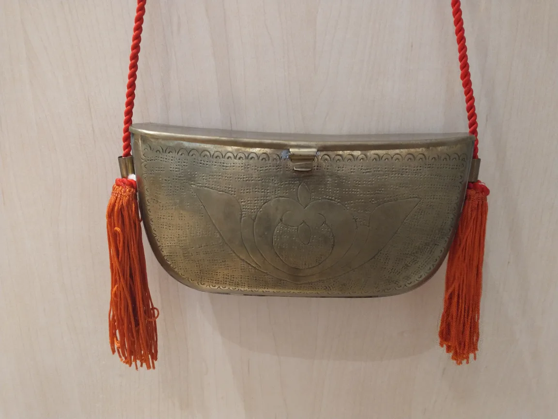 Antique bronze metal clutch bag with red tassles thumbnail