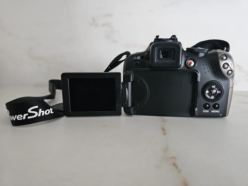 Canon PowerShot SX20 IS Digital Camera with Bag image indicator(2)