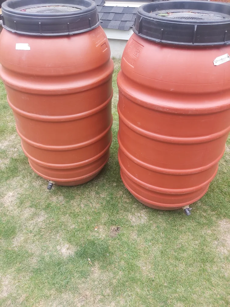 Two Orange Plastic Rain Barrels image indicator(6)