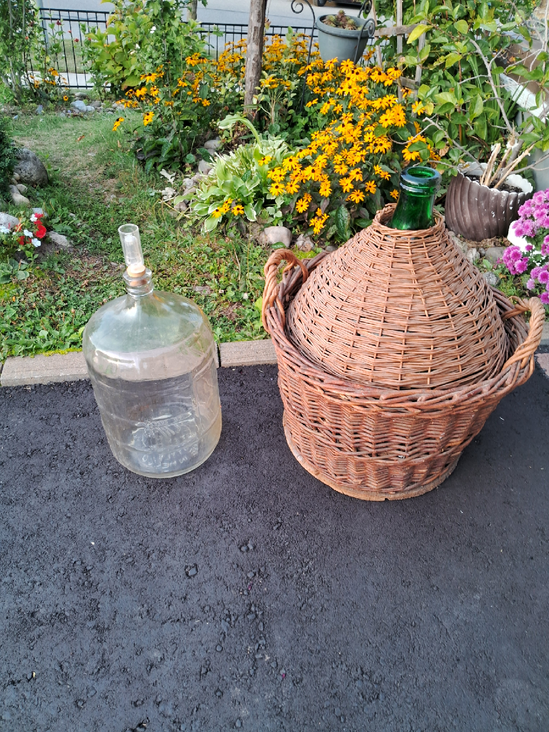Demijohn Glass Bottle and Wicker Basket
