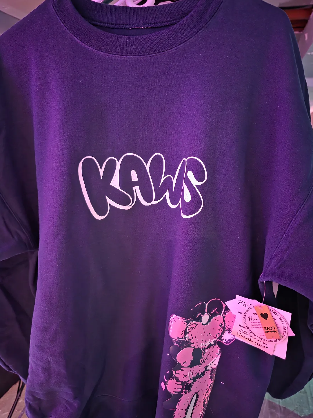 KAWS Crewneck Sweatshirt & Graphic Tee image indicator(5)