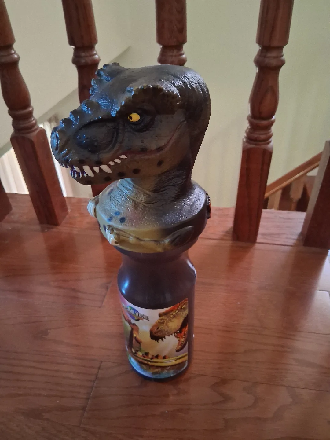 Vintage Universal Studios Jurassic Park T-Rex bottle with handle thumbnail