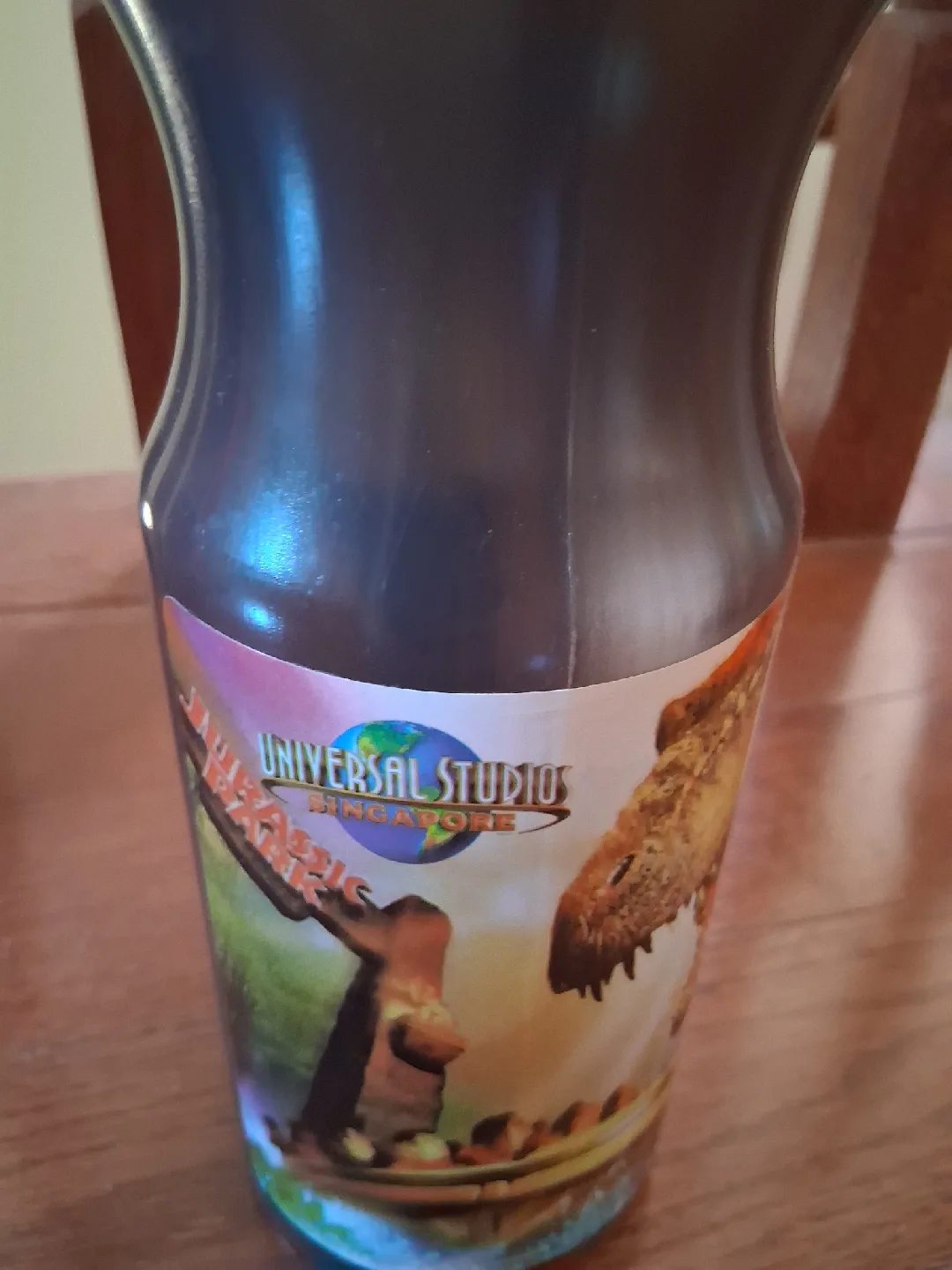 Vintage Universal Studios Jurassic Park T-Rex bottle with handle image indicator(4)