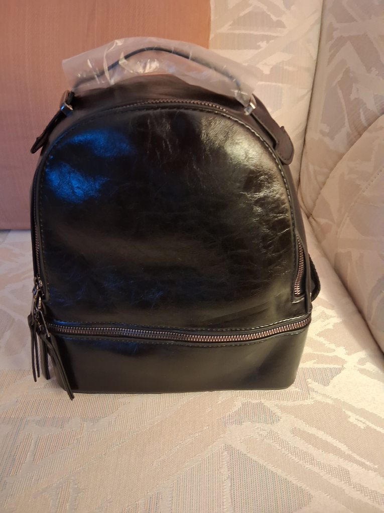Black genuine leather backpack