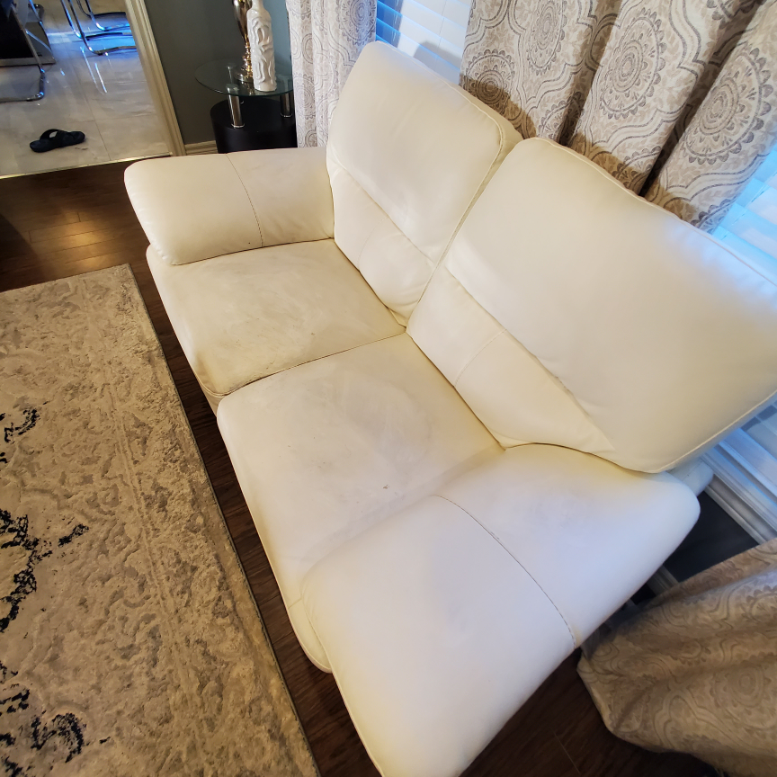 White Leather Sofa & Black Dining Chairs