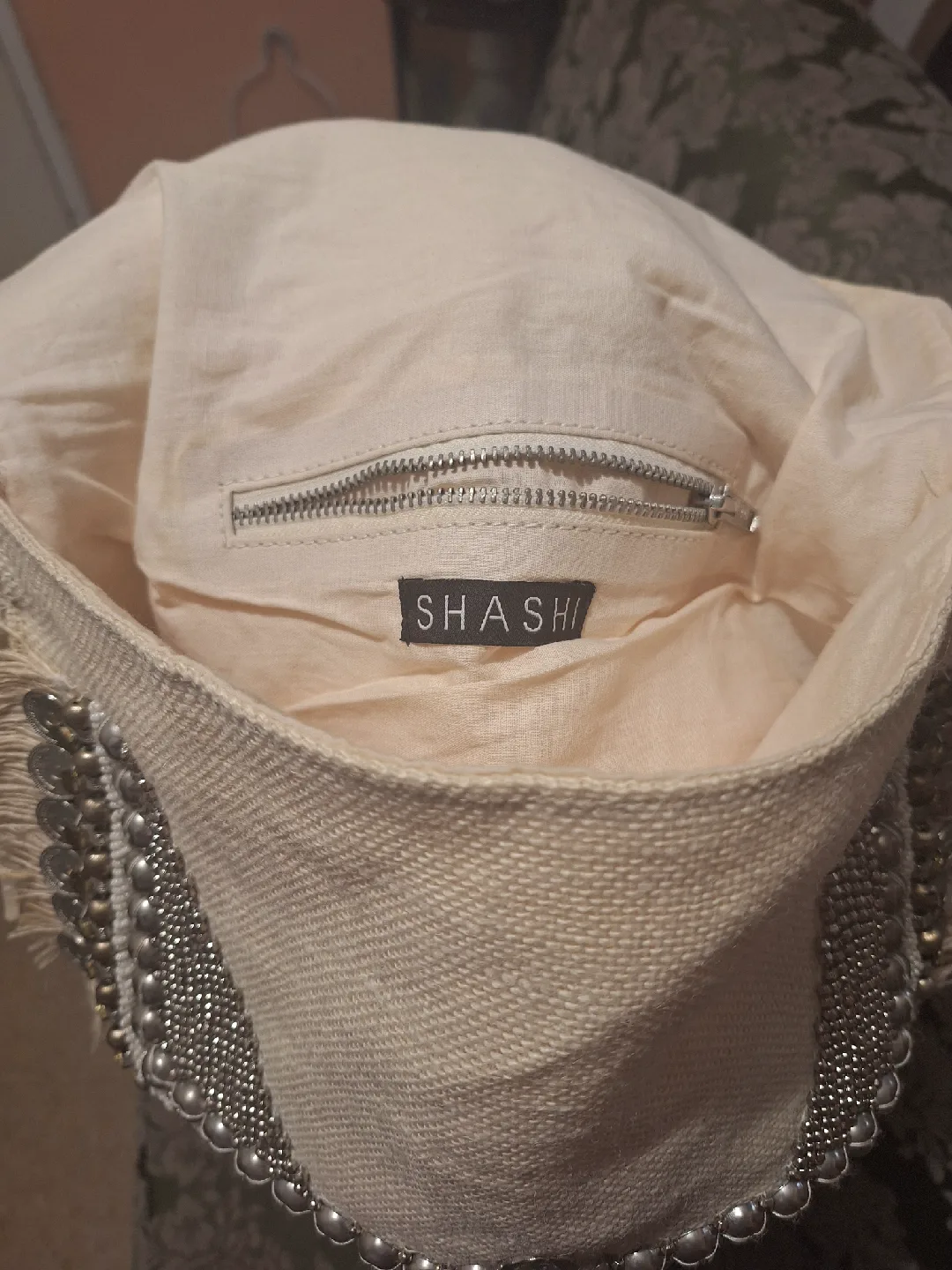 Shashi Cream Fringe Embellished Crossbody Bag image indicator(3)