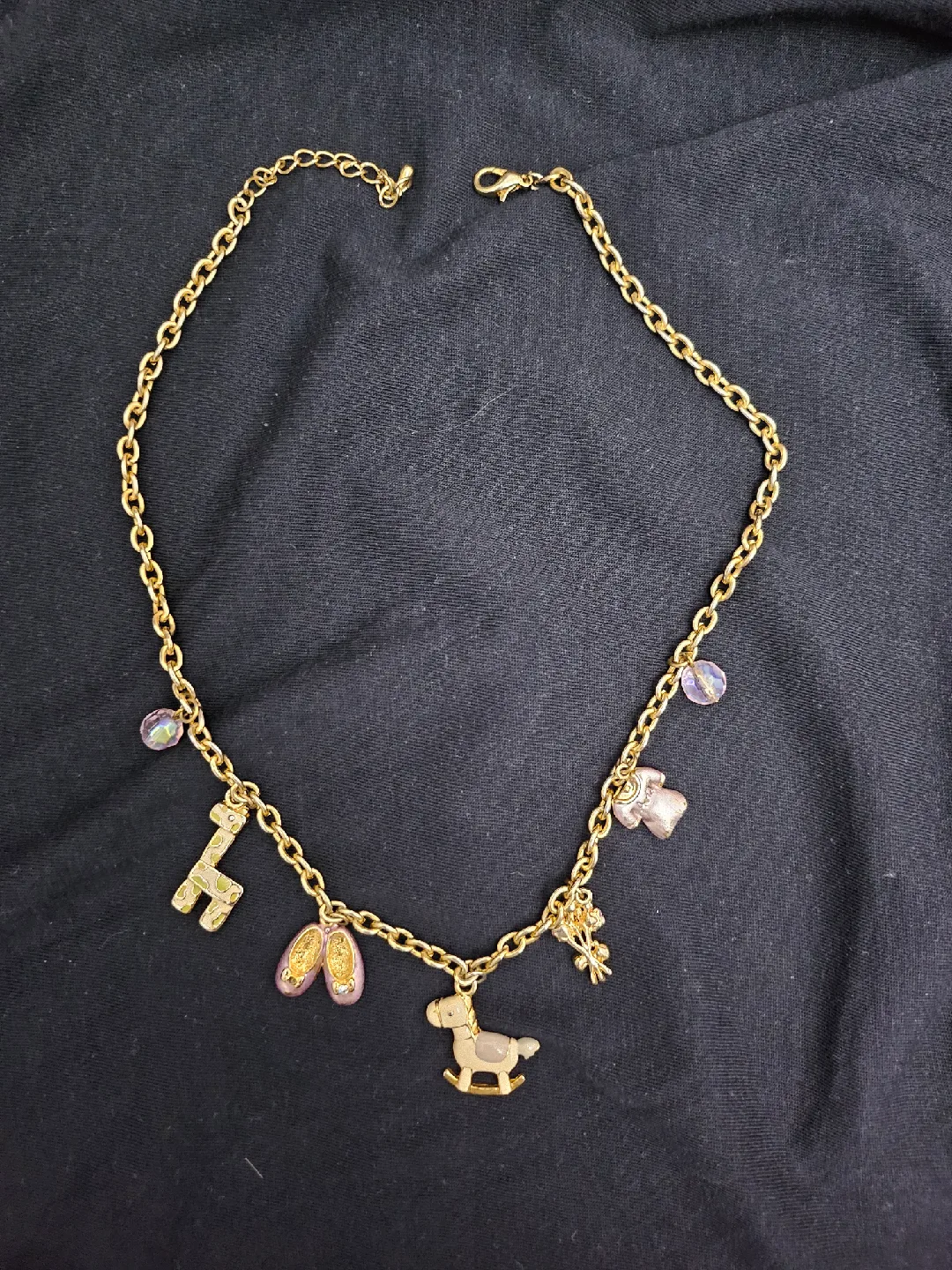 Gold Charm Necklace with Giraffe, Shoes, Rocking Horse thumbnail