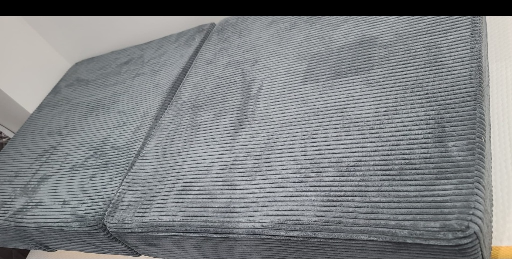 Grey folding bed or seat