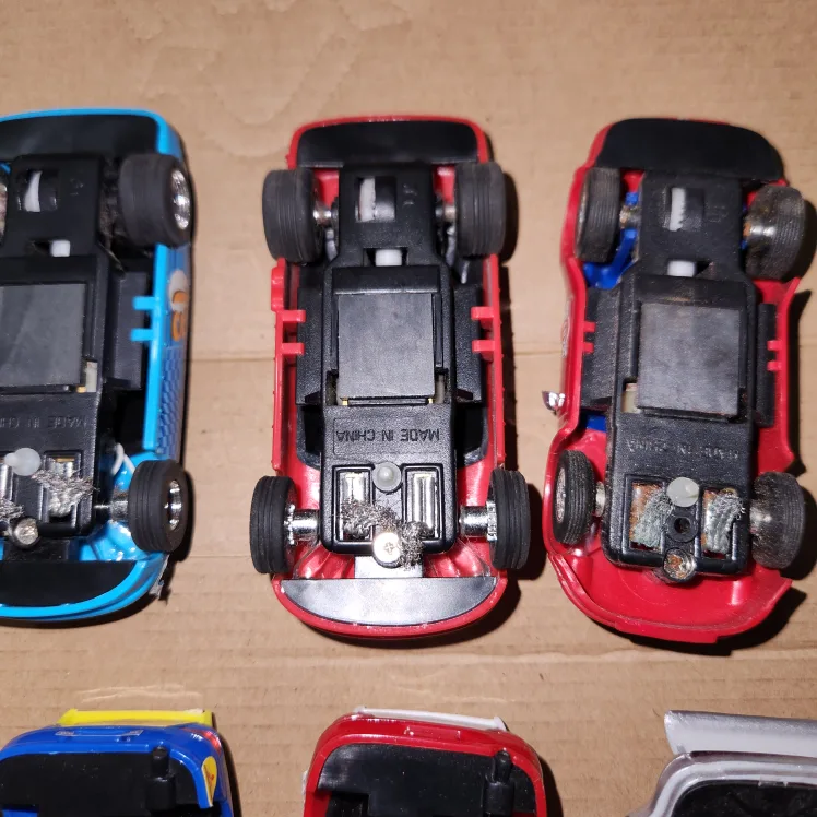 Lot of 10 Toy Artin slot Racing Cars image indicator(7)