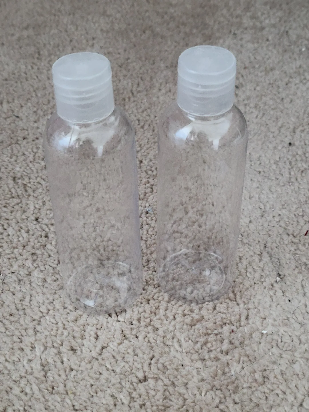 Two Empty Clear Plastic Bottles thumbnail