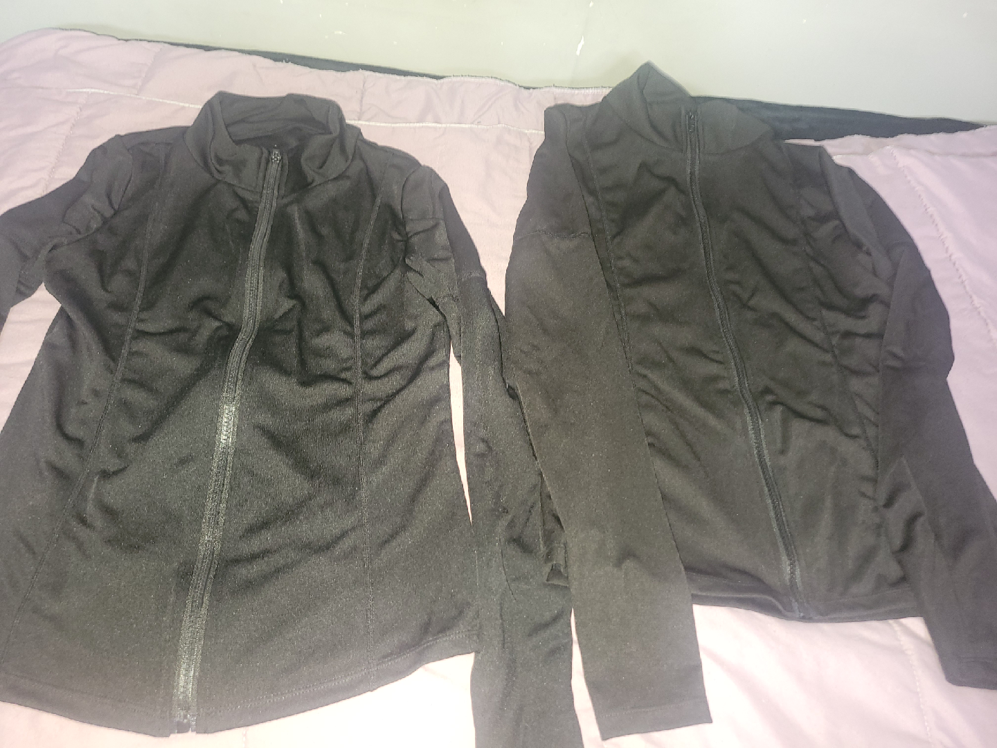 TWO Black Zip-Up sweaters