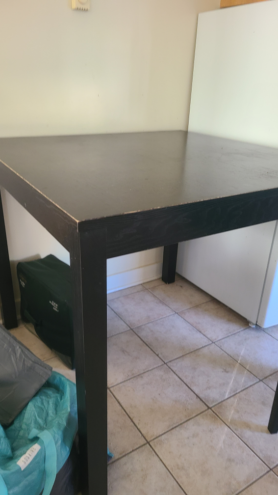 Square Black Table with Beige Bar Stools