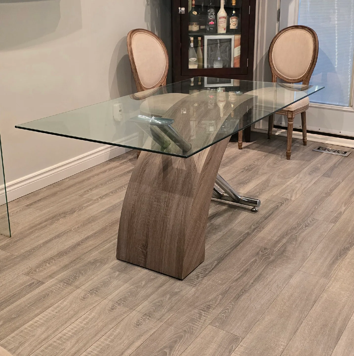 Glass Top Dining Table with Unique Base image indicator(2)