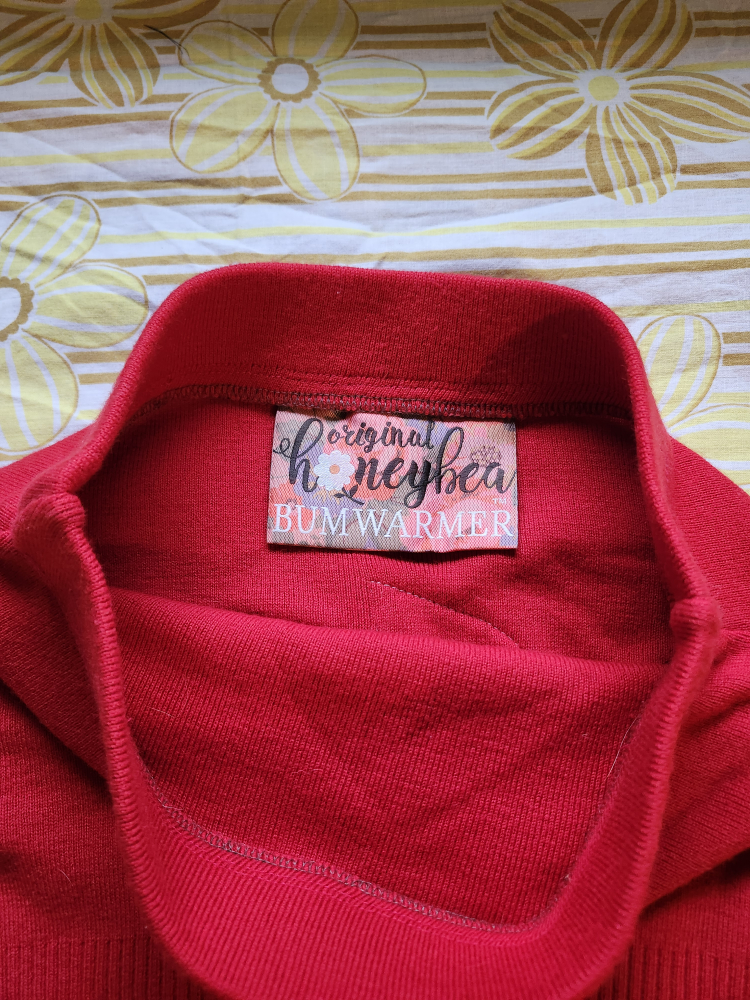 Red and black Bum Warmer mini sweater skirt with flower detail - photo 5