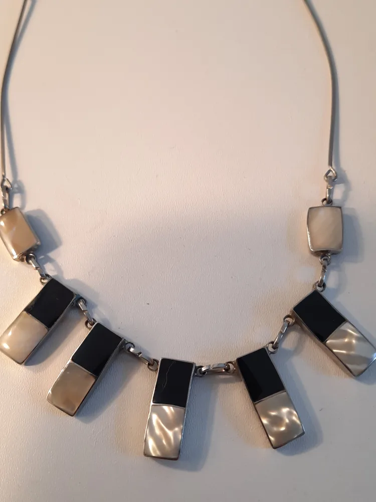 Necklace Lot: Black, White, Silver image indicator(4)