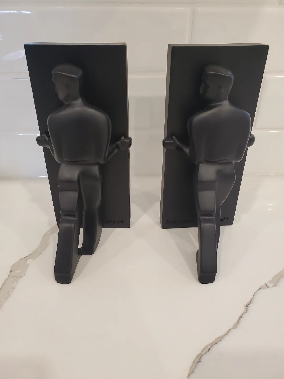 Chris Collicott Kikkerland Leaning men Bookends set of 2 image indicator(4)