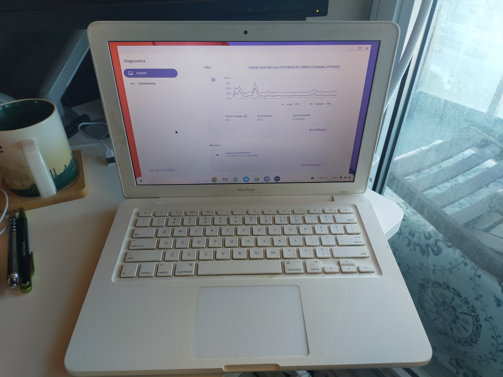 White Macbook Laptop with Chrome OS Flex