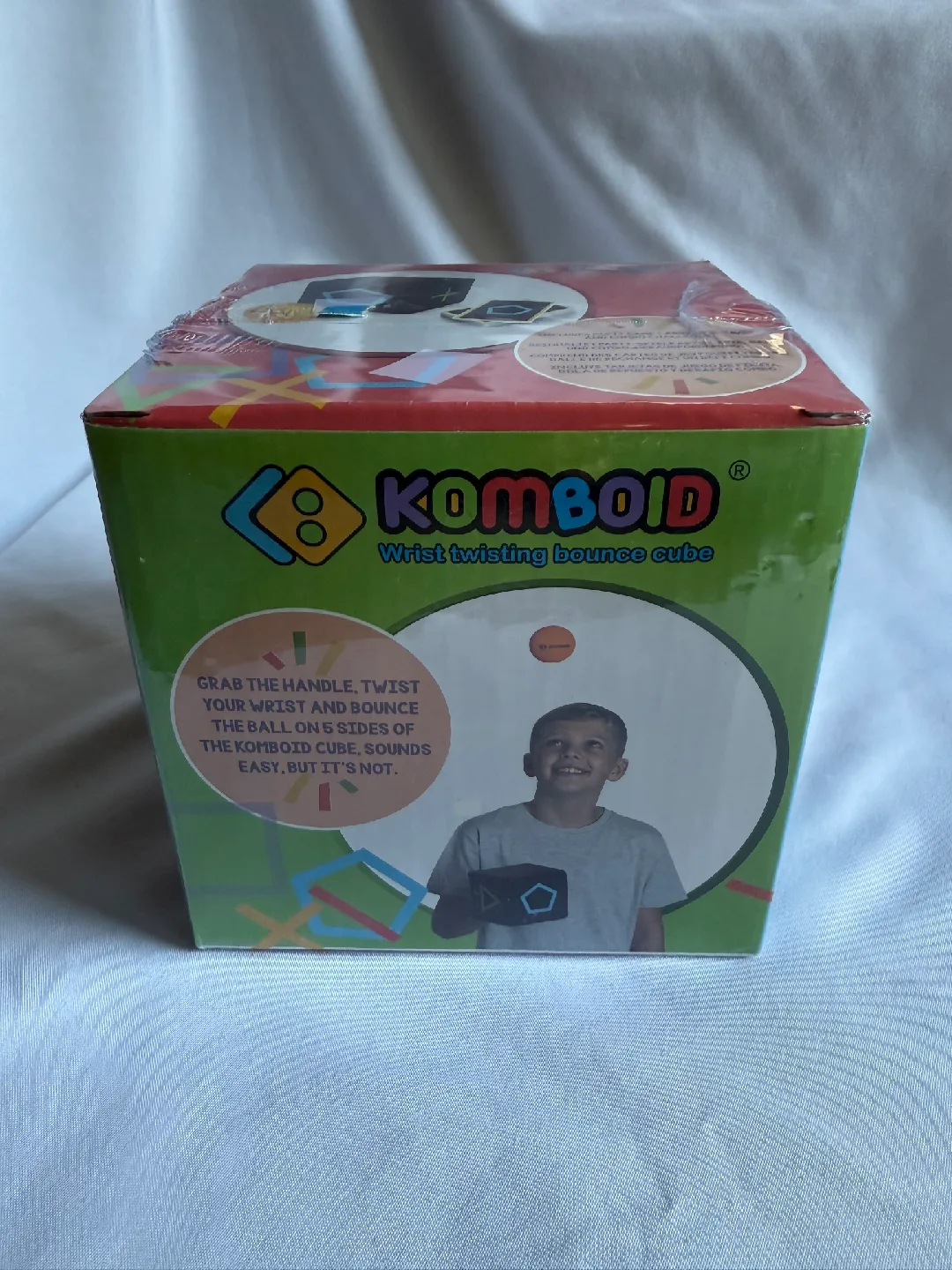 KOMBOID Wrist Twisting Bounce Cube - New in Box! image indicator(2)