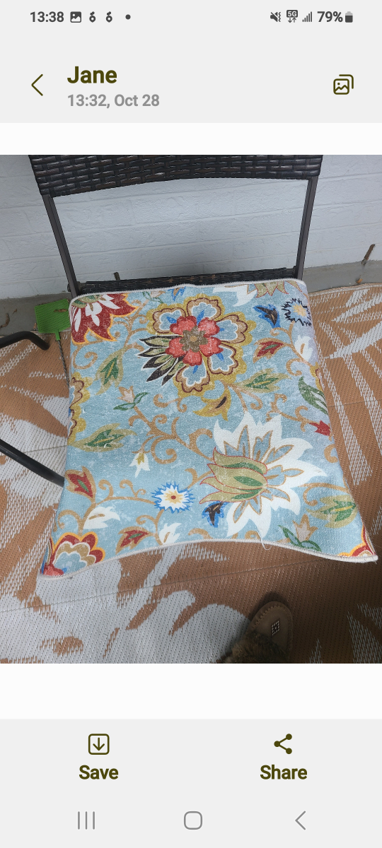 Three floral rugs.