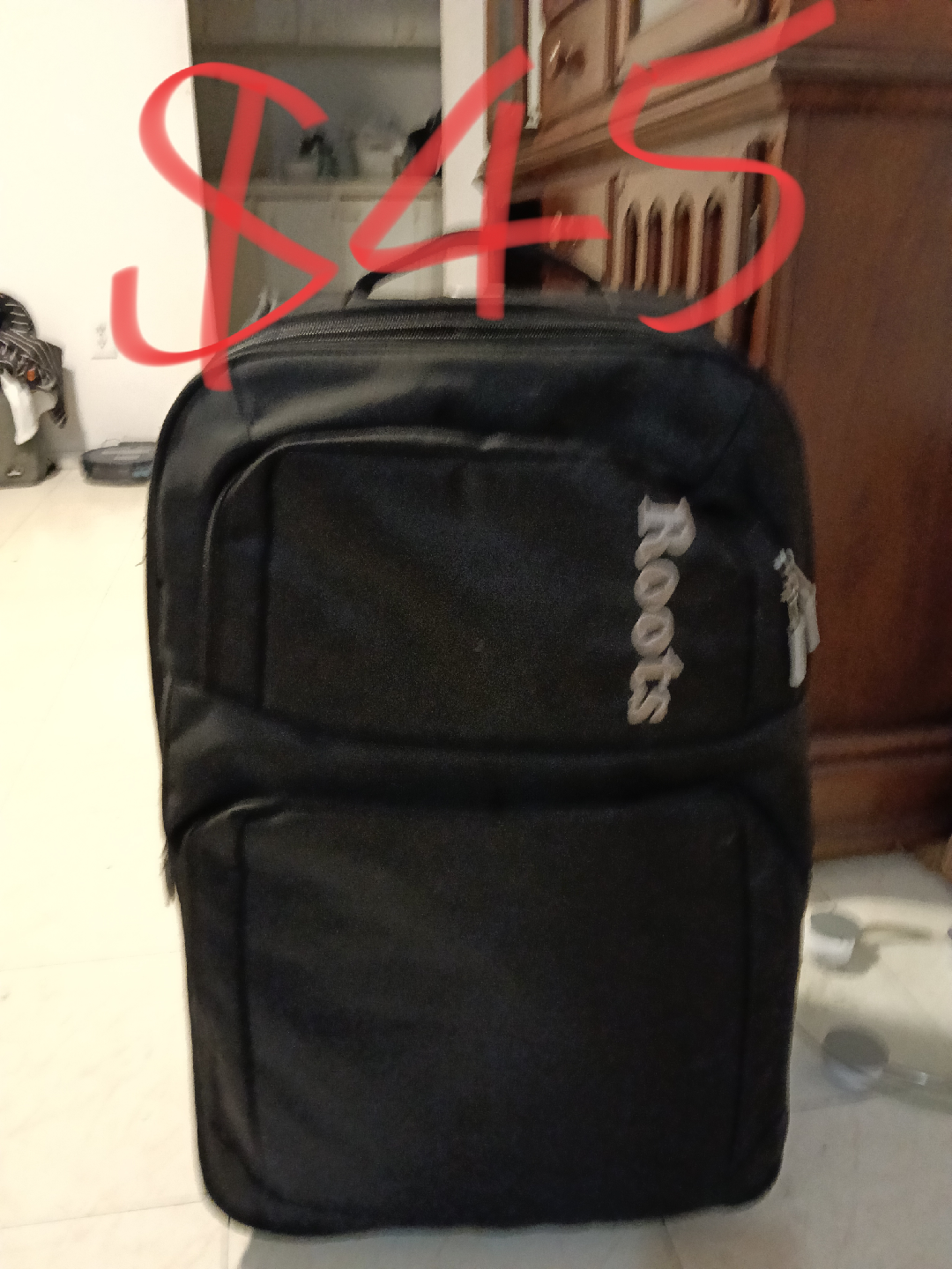 Roots Black luggage