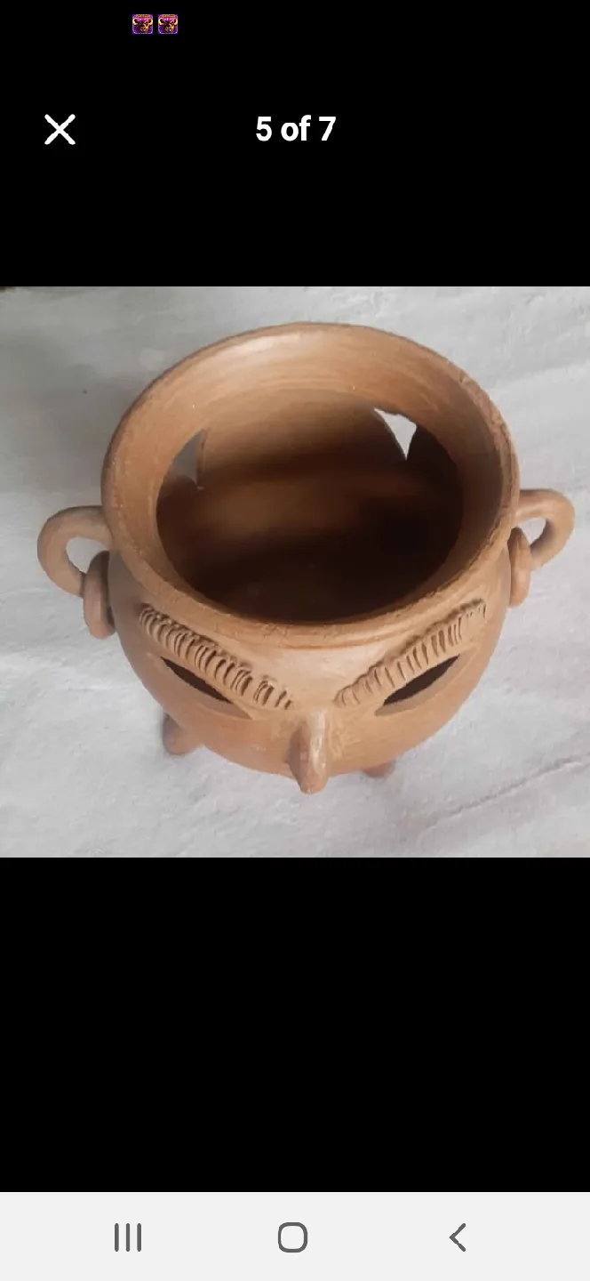 Clay Planter with Face Design image indicator(4)