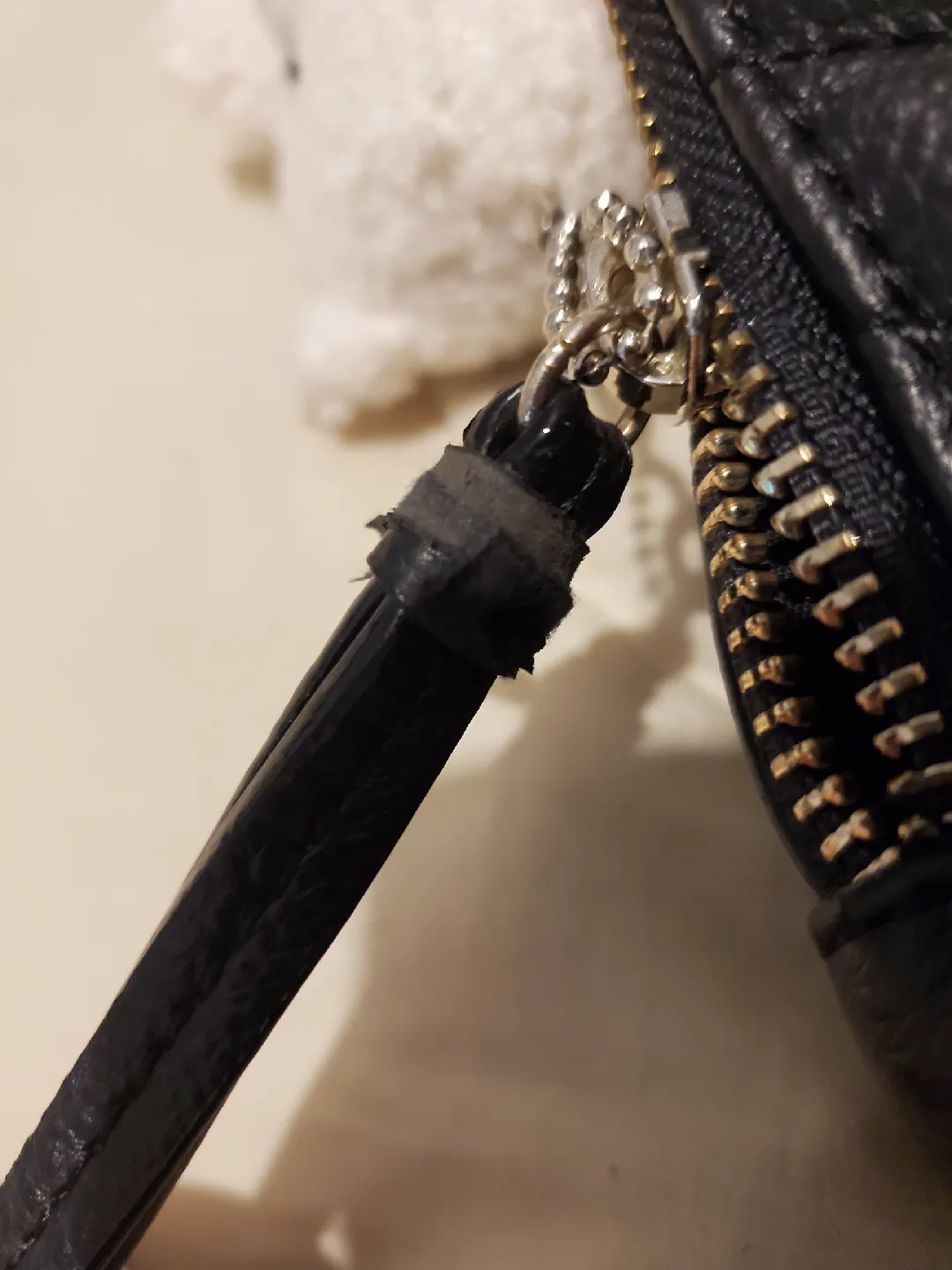 Victorias Secret black mini backpack with gold-like chain accent image indicator(4)