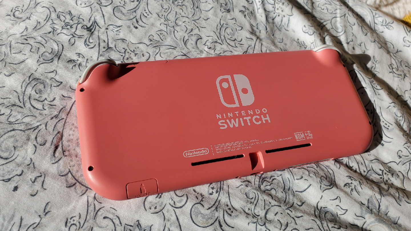 Nintendo Switch Lite with Animal Crossing New Horizons - photo 2