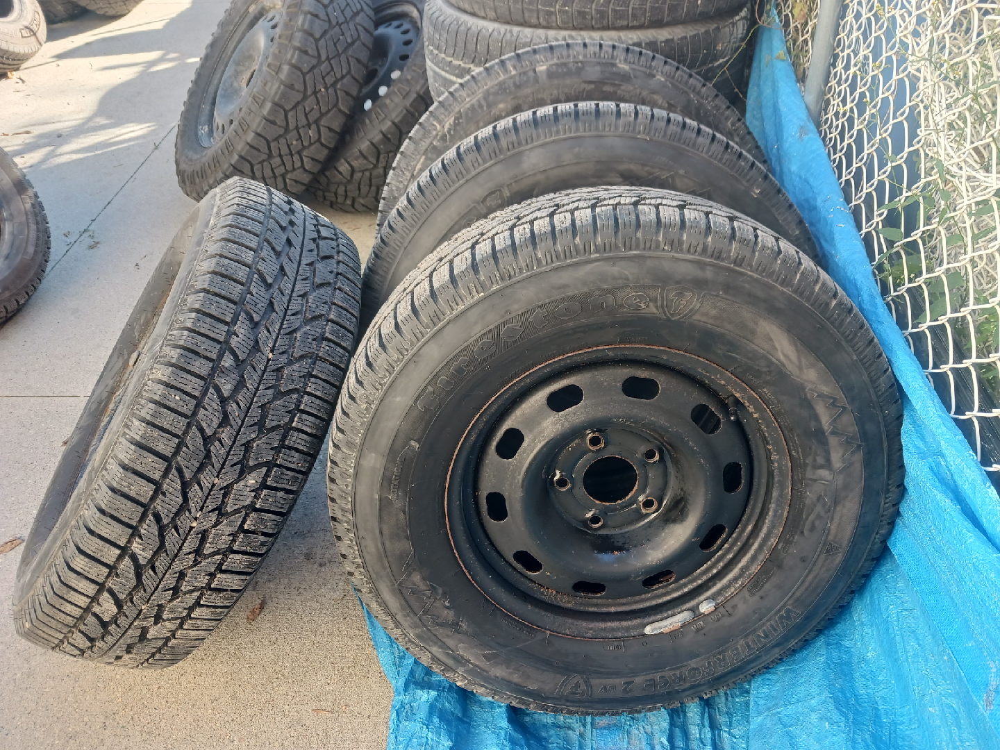 265 70 r17 FIRESTONE WINTERFORCE UV TIRES 5x139.7 RAM 1500 RIMS