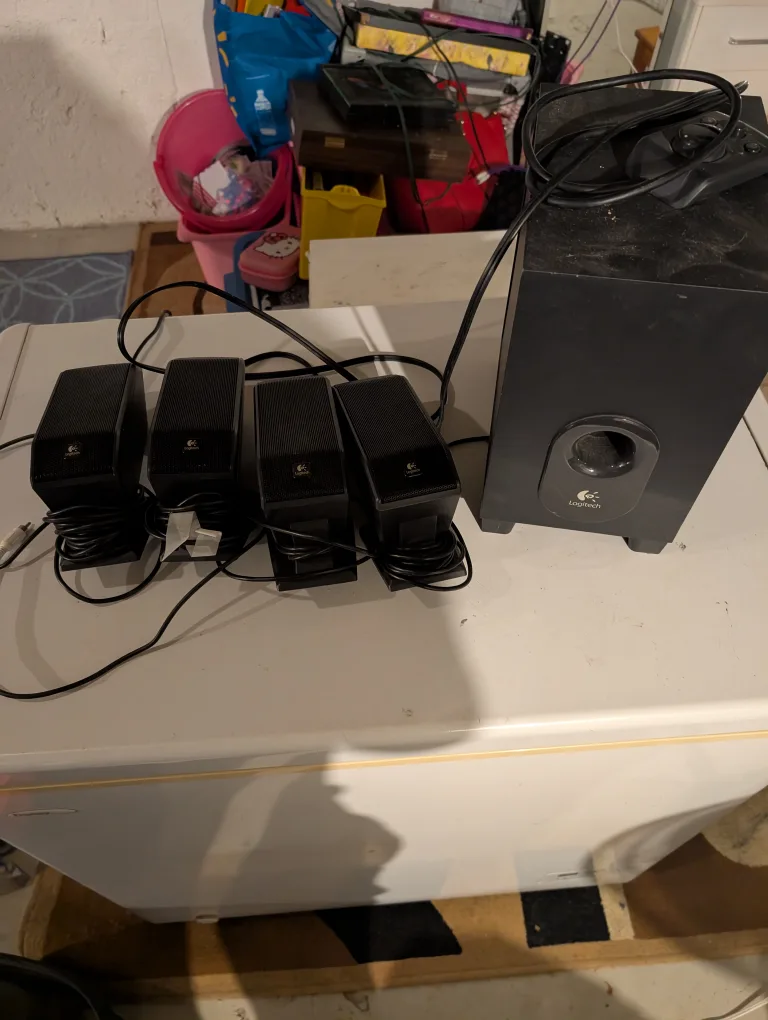 Logitech 4 speaker and 1 sub set in like new condition