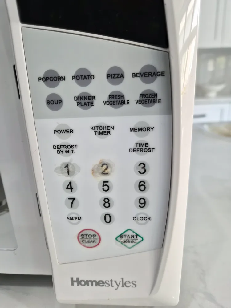 Homestyles 0.7 cu ft Microwave Oven image indicator(4)