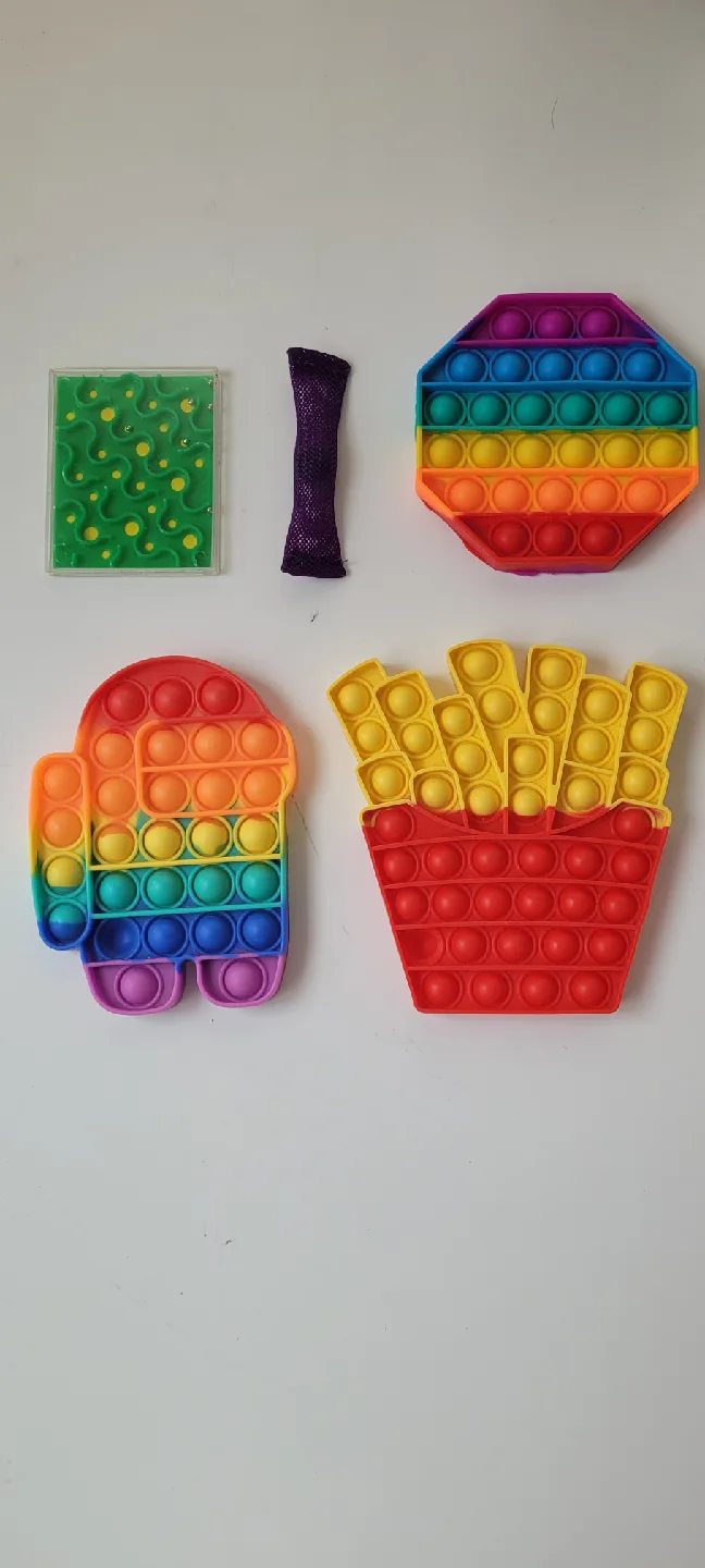 Assorted Toys: Sunglasses, Teddy Bear, Toy Cars image indicator(7)