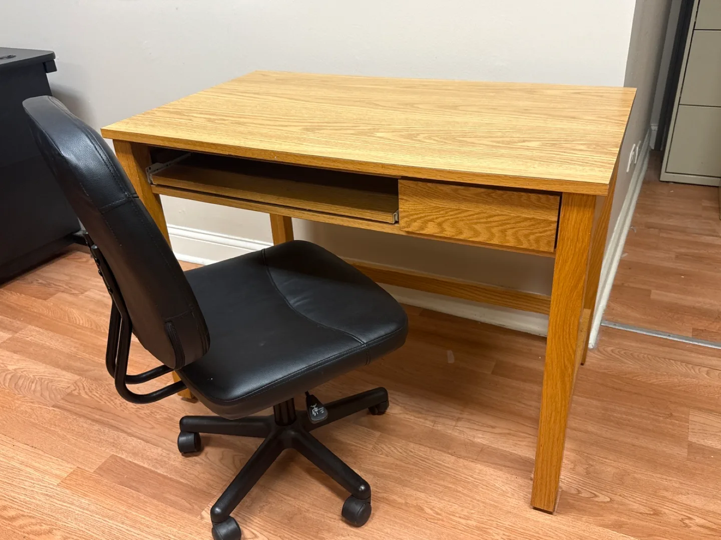 Wooden Desk with Black Office Chair thumbnail