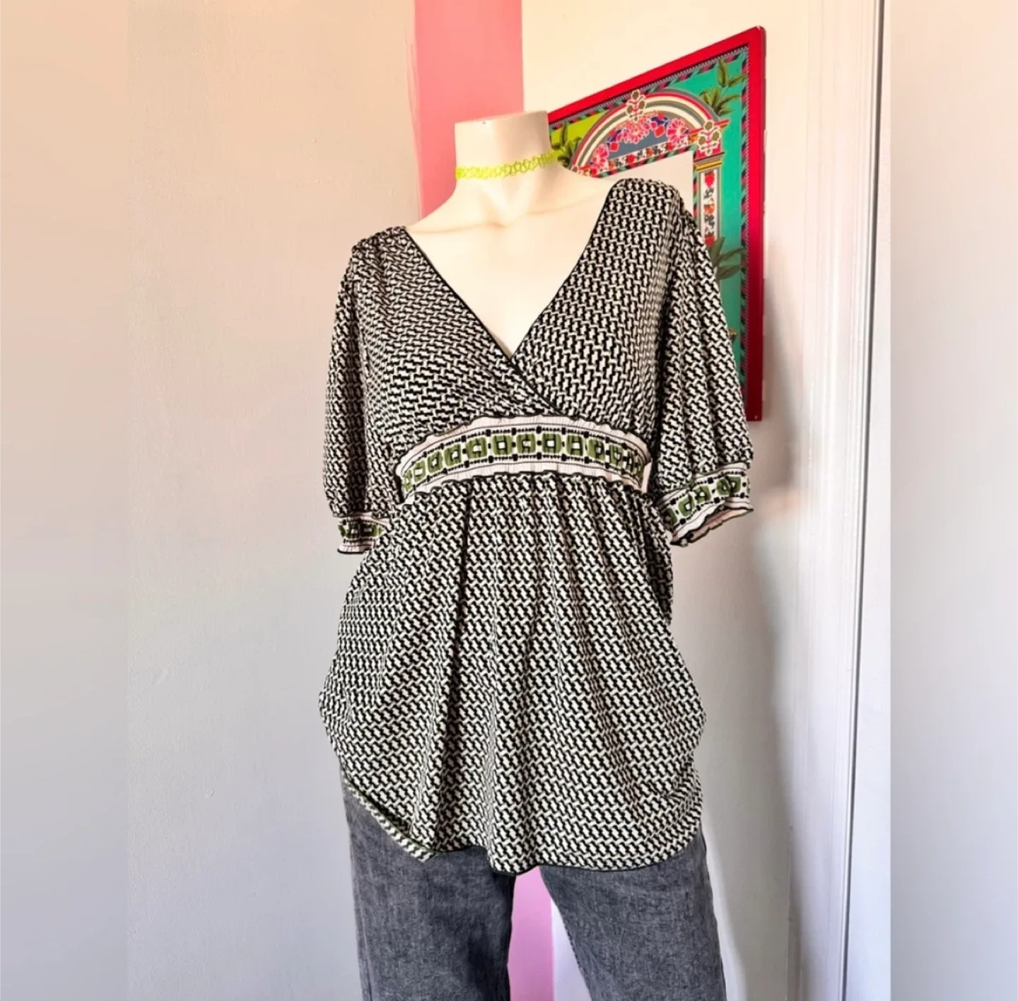 Black and green boho blouse with a flowy, asymmetrical design thumbnail
