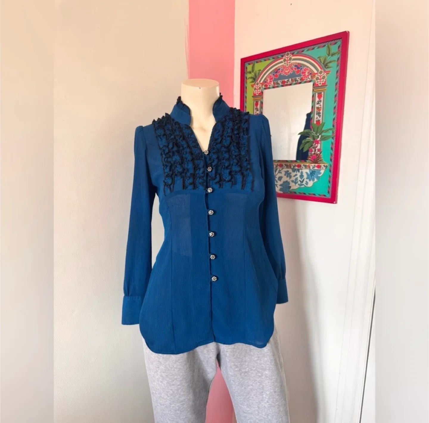 Navy blue button-up blouse with black ruffle collar thumbnail