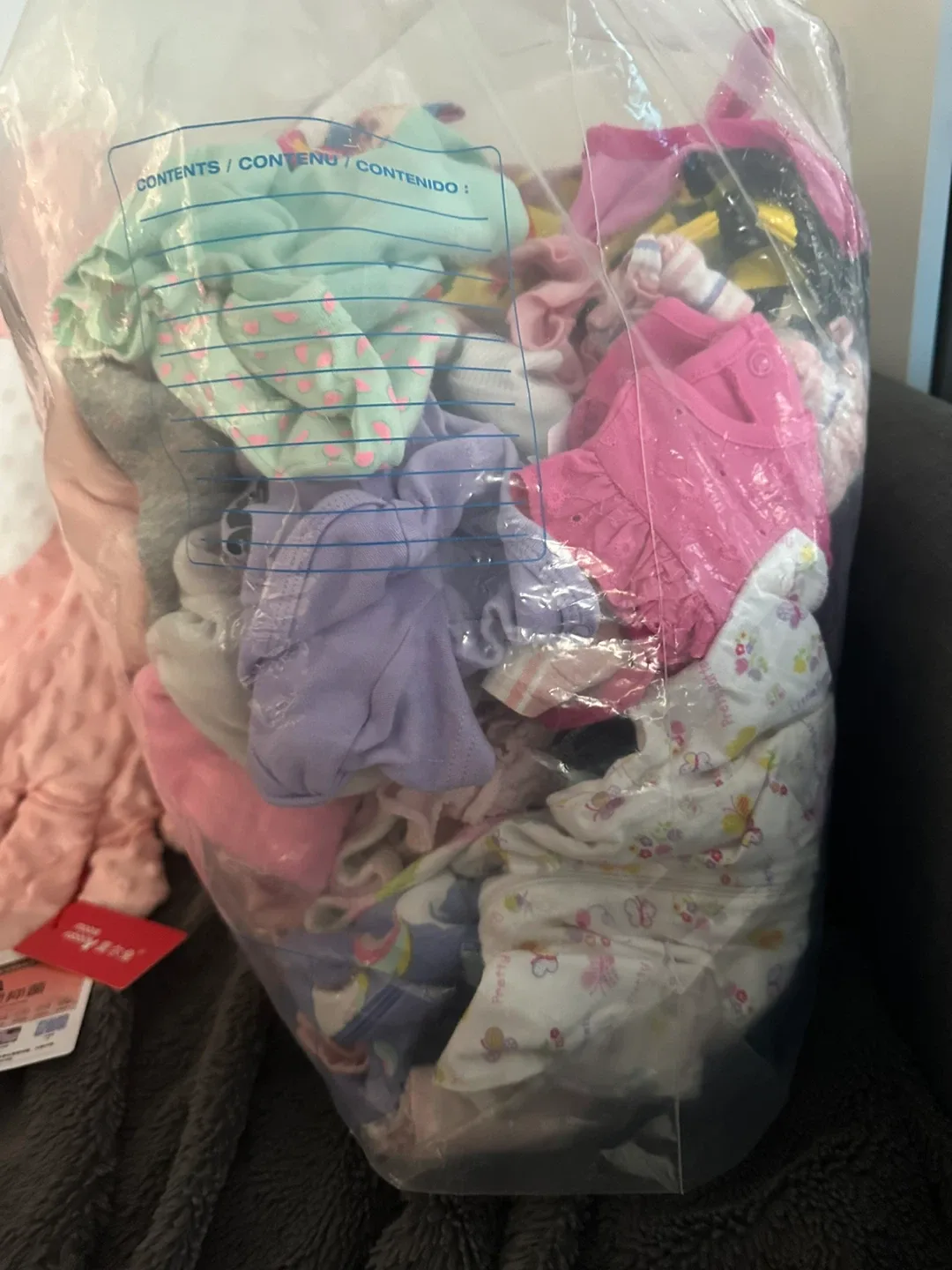Bag of baby clothes image indicator(2)