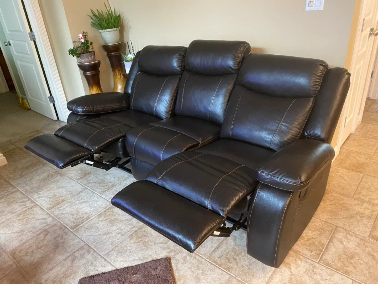 Brown Leather Reclining Sofa