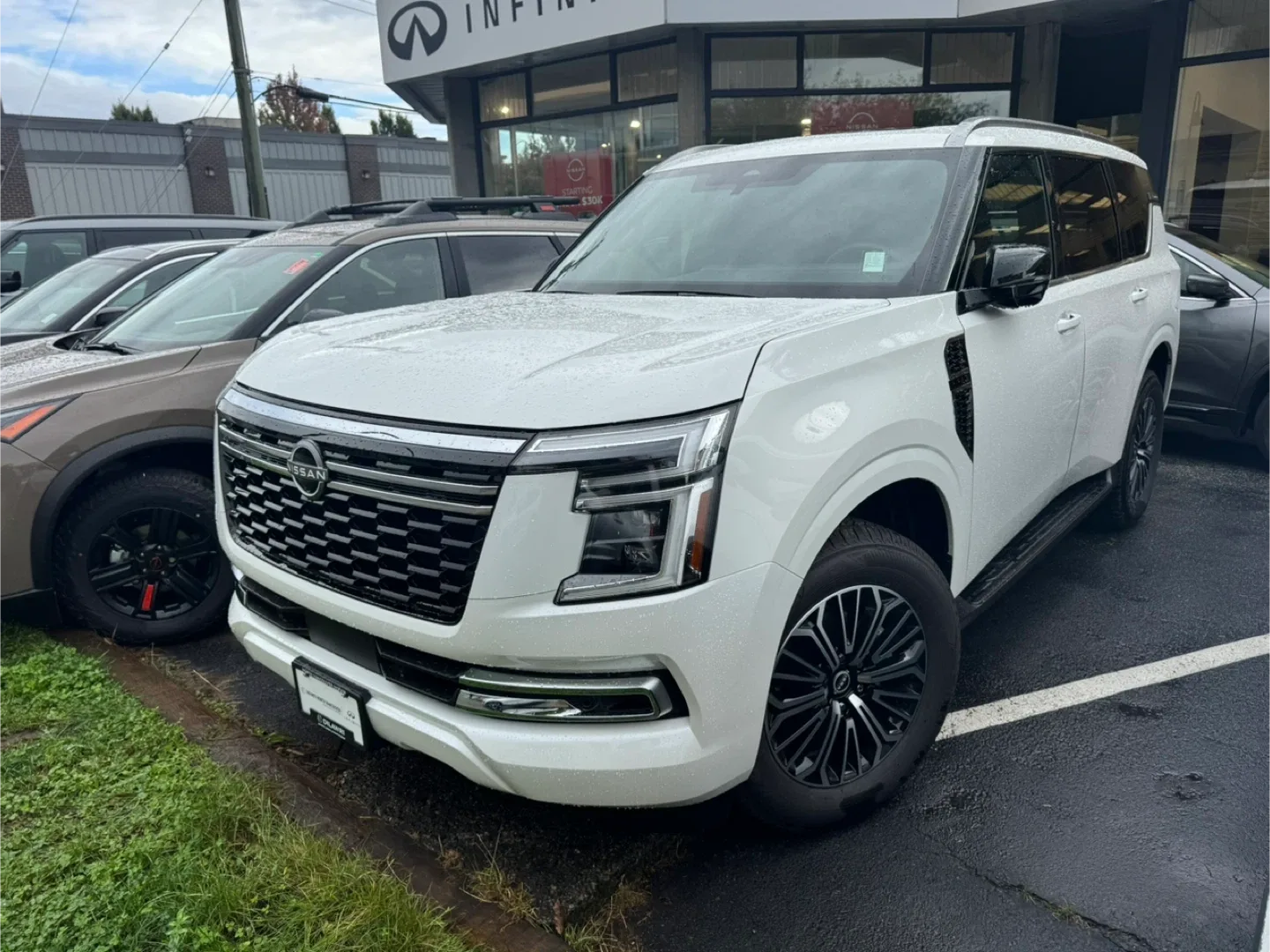 Nissan Armada SL - White SUV image indicator(2)