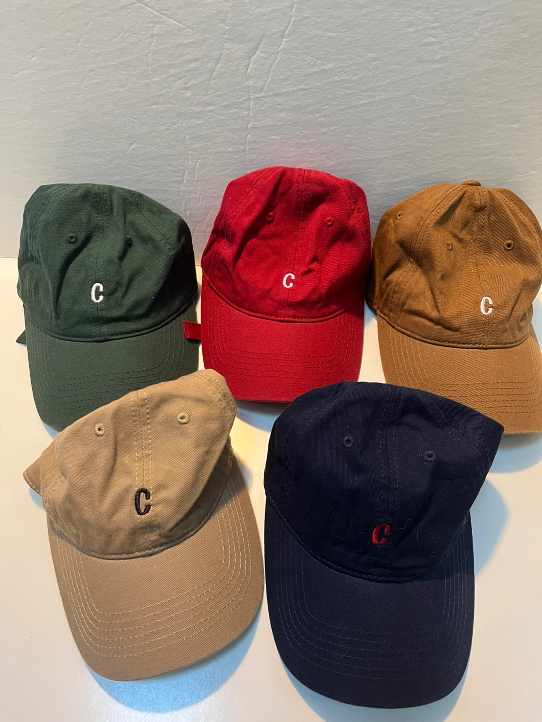 ‘C’ Baseball Caps (Lot)