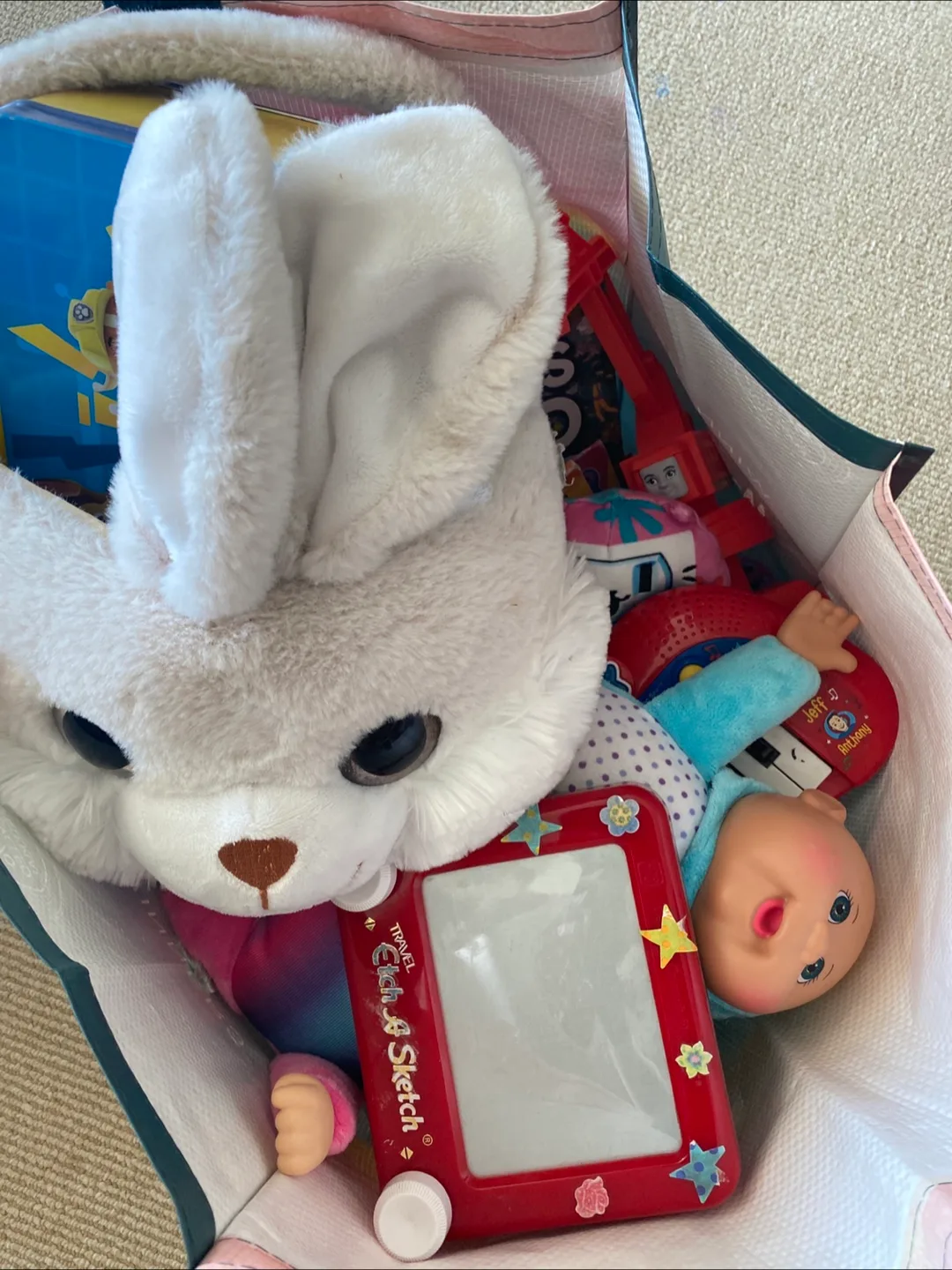 Assorted Toys: Plush, Etch A Sketch, Doll thumbnail
