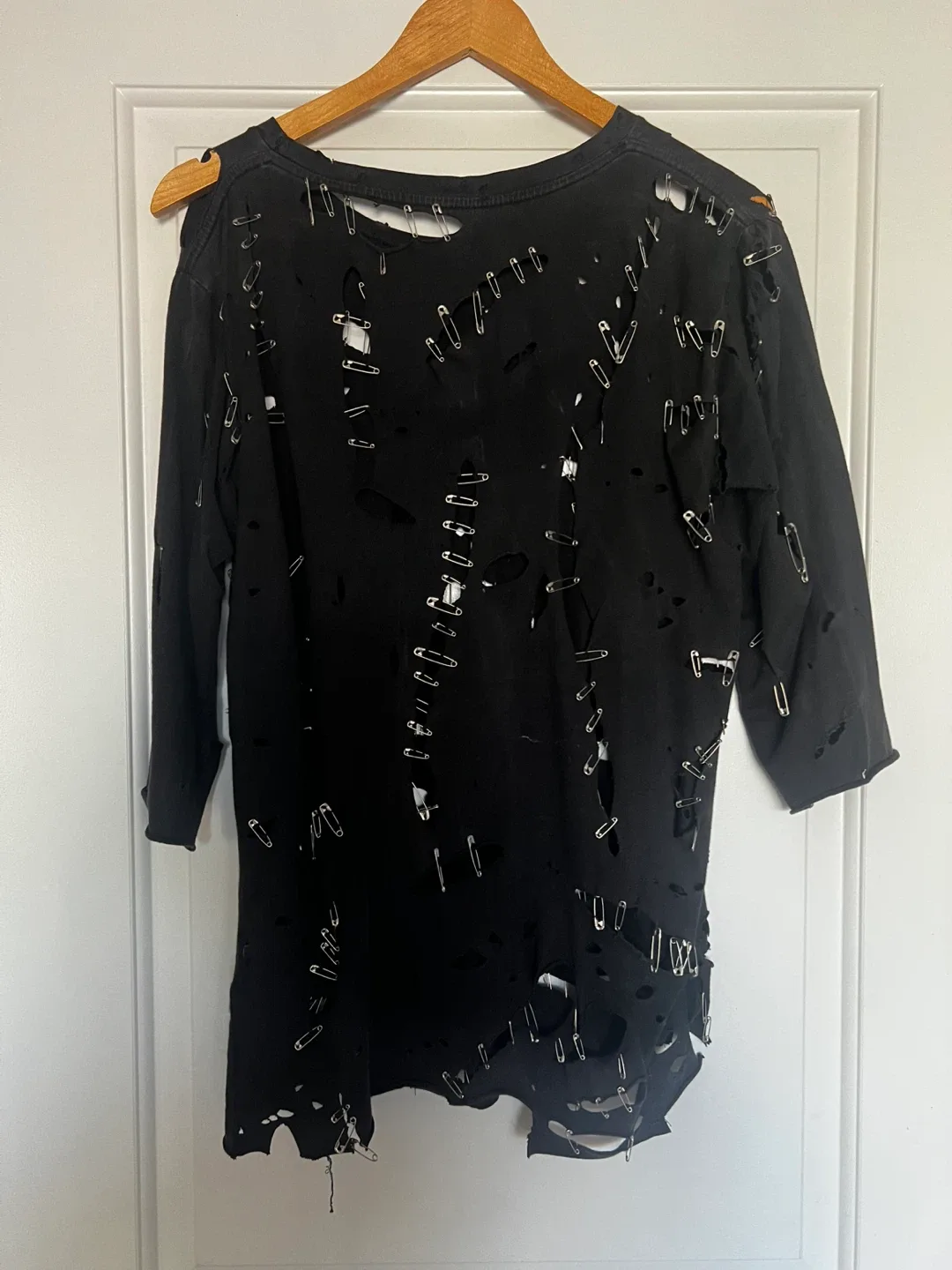 Balmain black distressed t-shirt with safety pins image indicator(3)