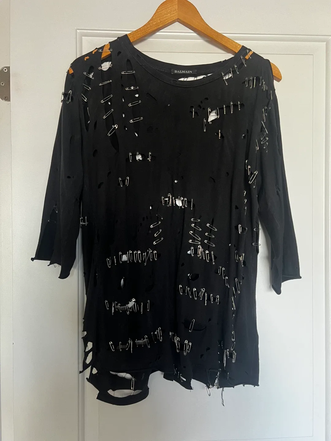 Balmain black distressed t-shirt with safety pins image indicator(2)