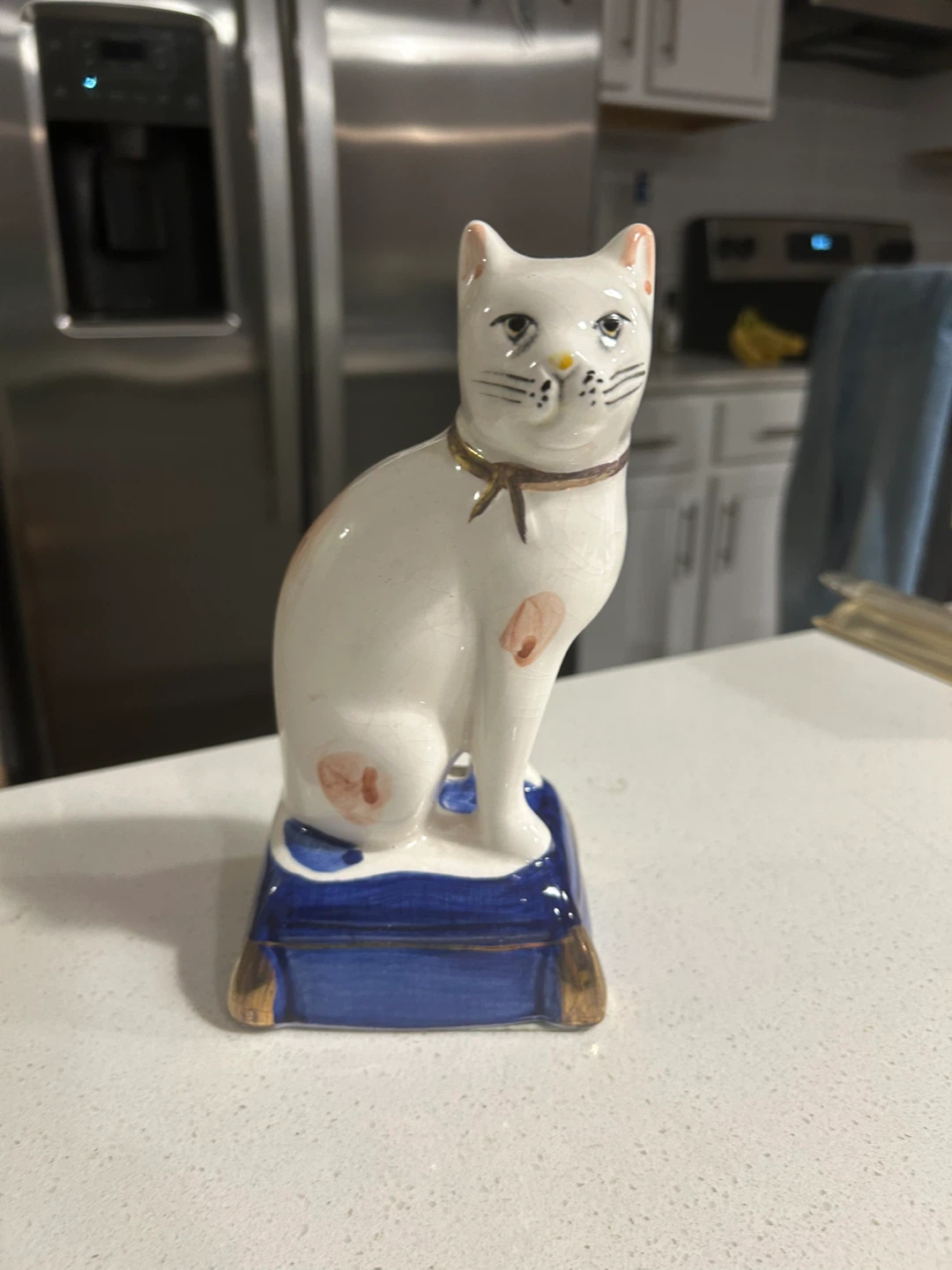 Vintage Staffordshire-style cat figurine