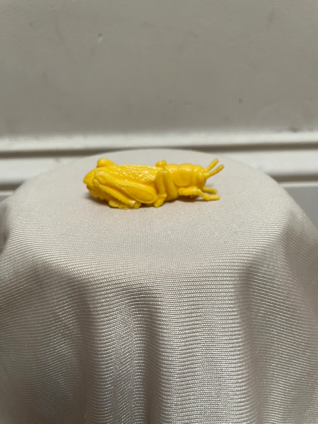 Yellow Plastic Toy Grasshopper