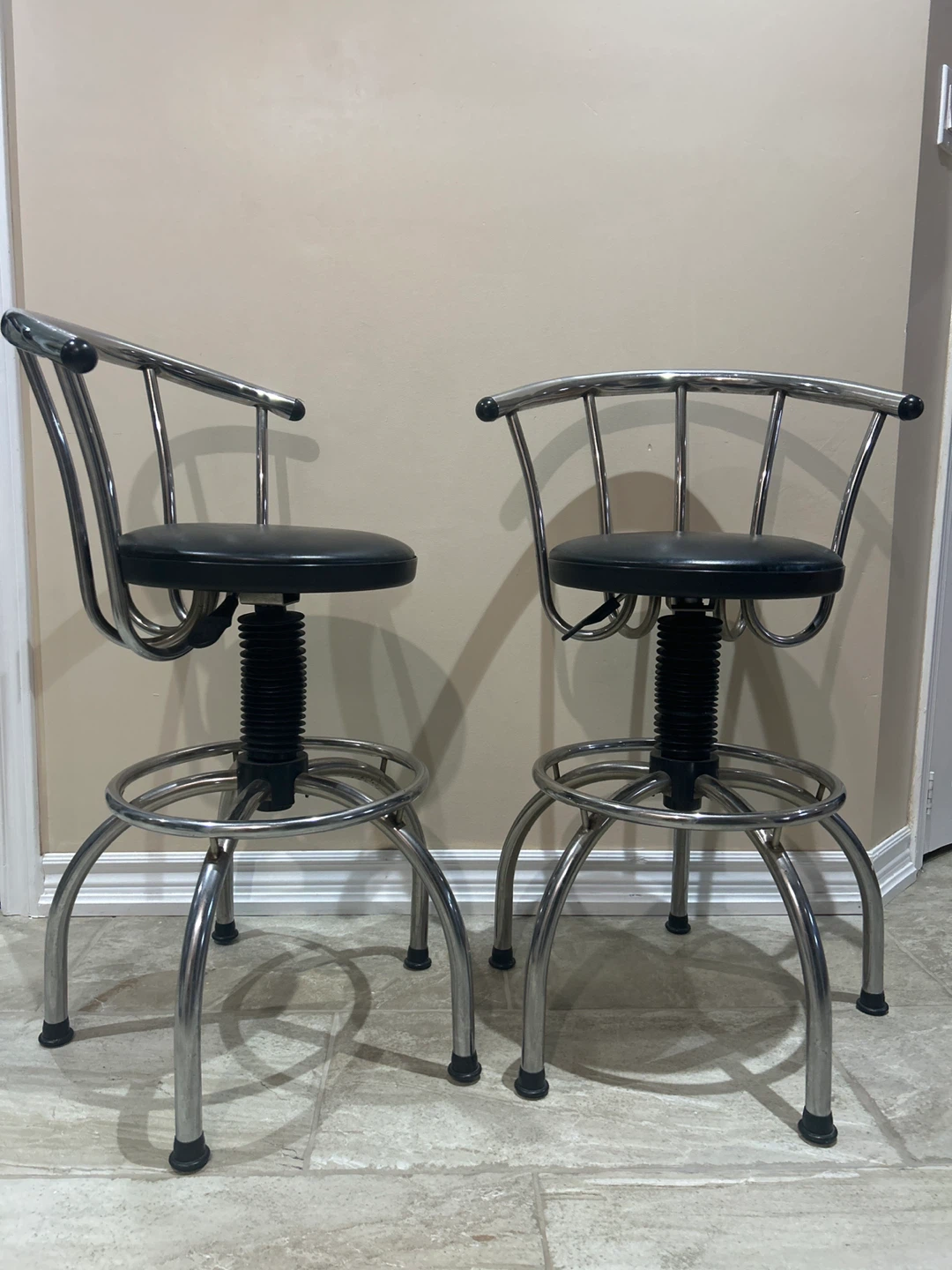 Two Chrome & Black Swivel Bar Stools
