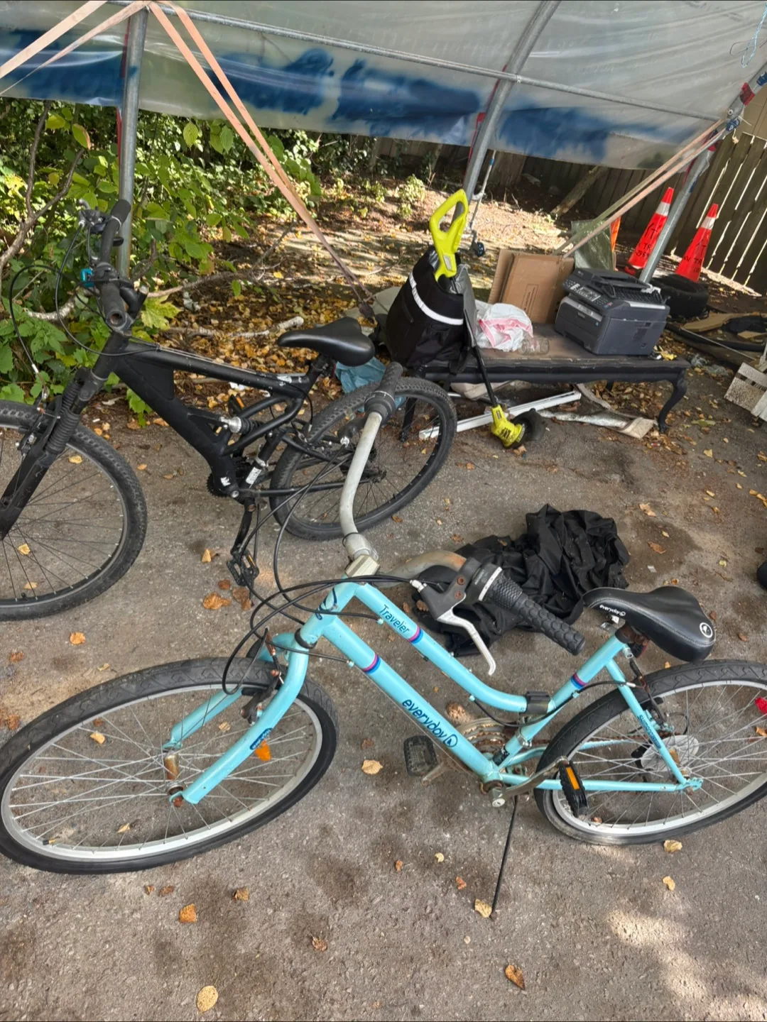Two Used Bikes - Black Mountain Bike & Blue Everyday Traveller image indicator(5)