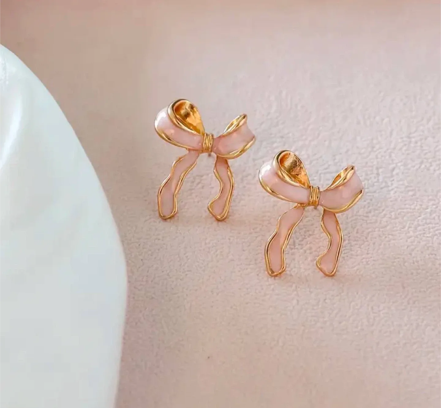 Chic pink bow stud earrings thumbnail