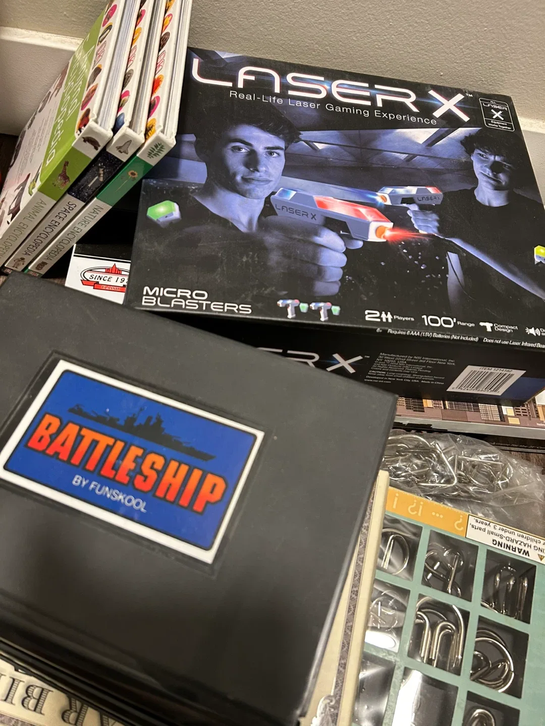 Assorted toys and some books image indicator(7)