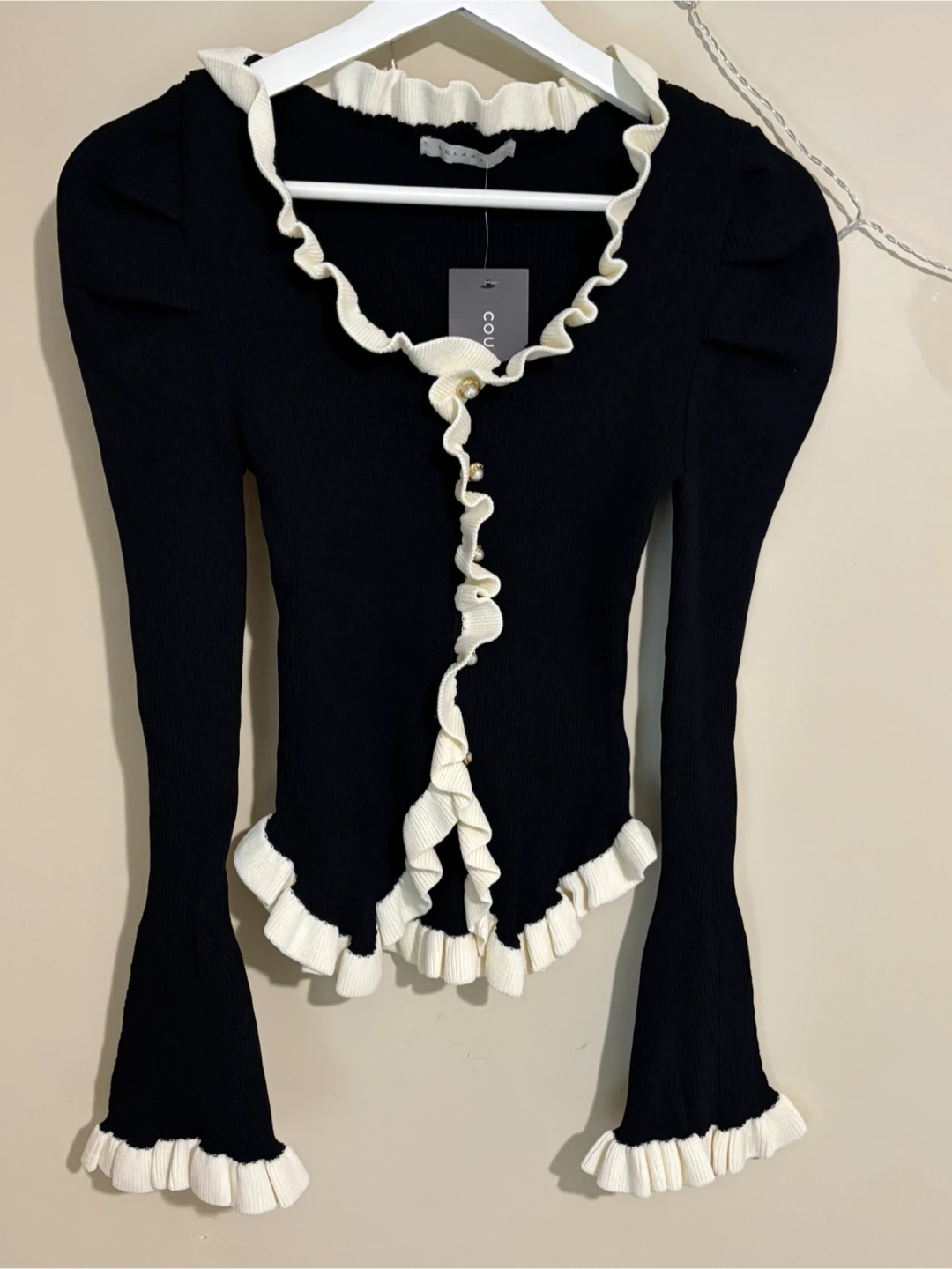 Contrasting Ruffle Edges Ribbed Knit Top