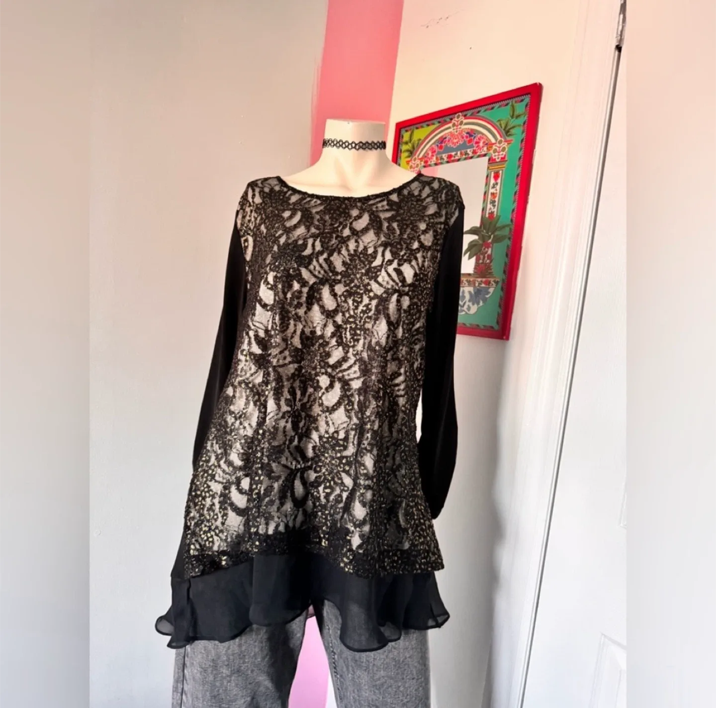 Black lace long sleeve blouse with sheer sleeves and ruffled hem thumbnail
